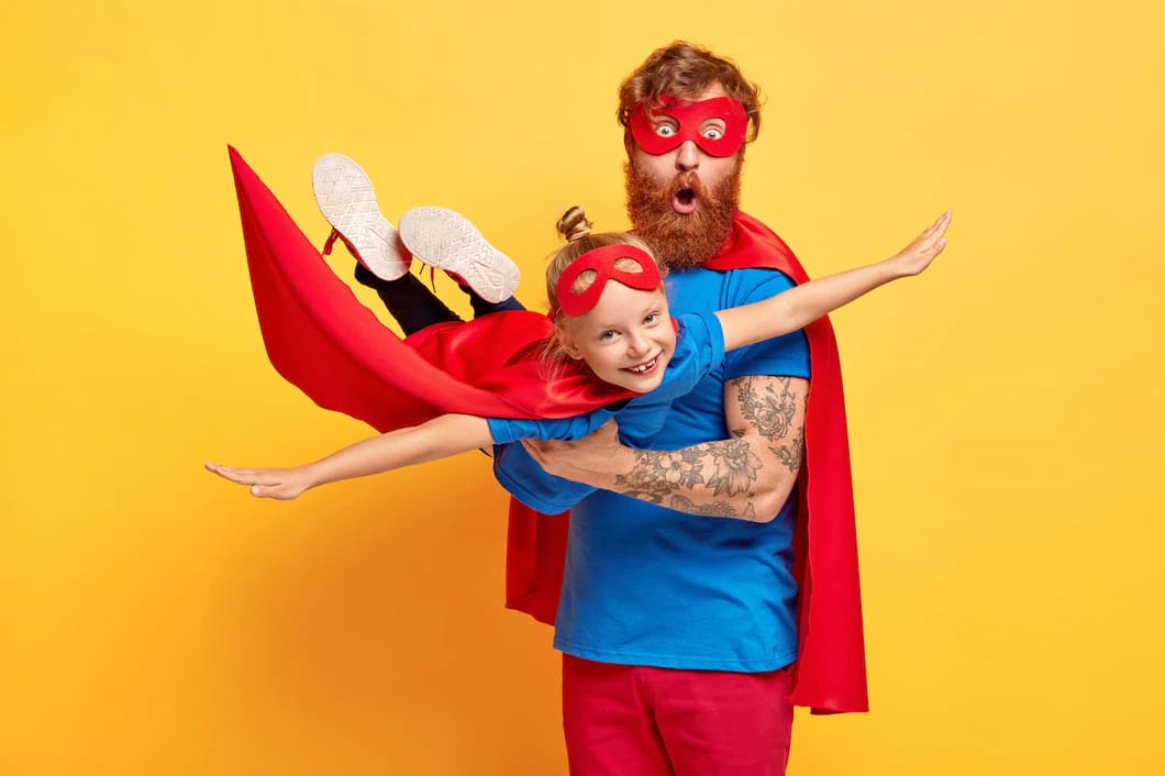 imagem de pai e filha ruivos vestidos de super herois 273609 29981